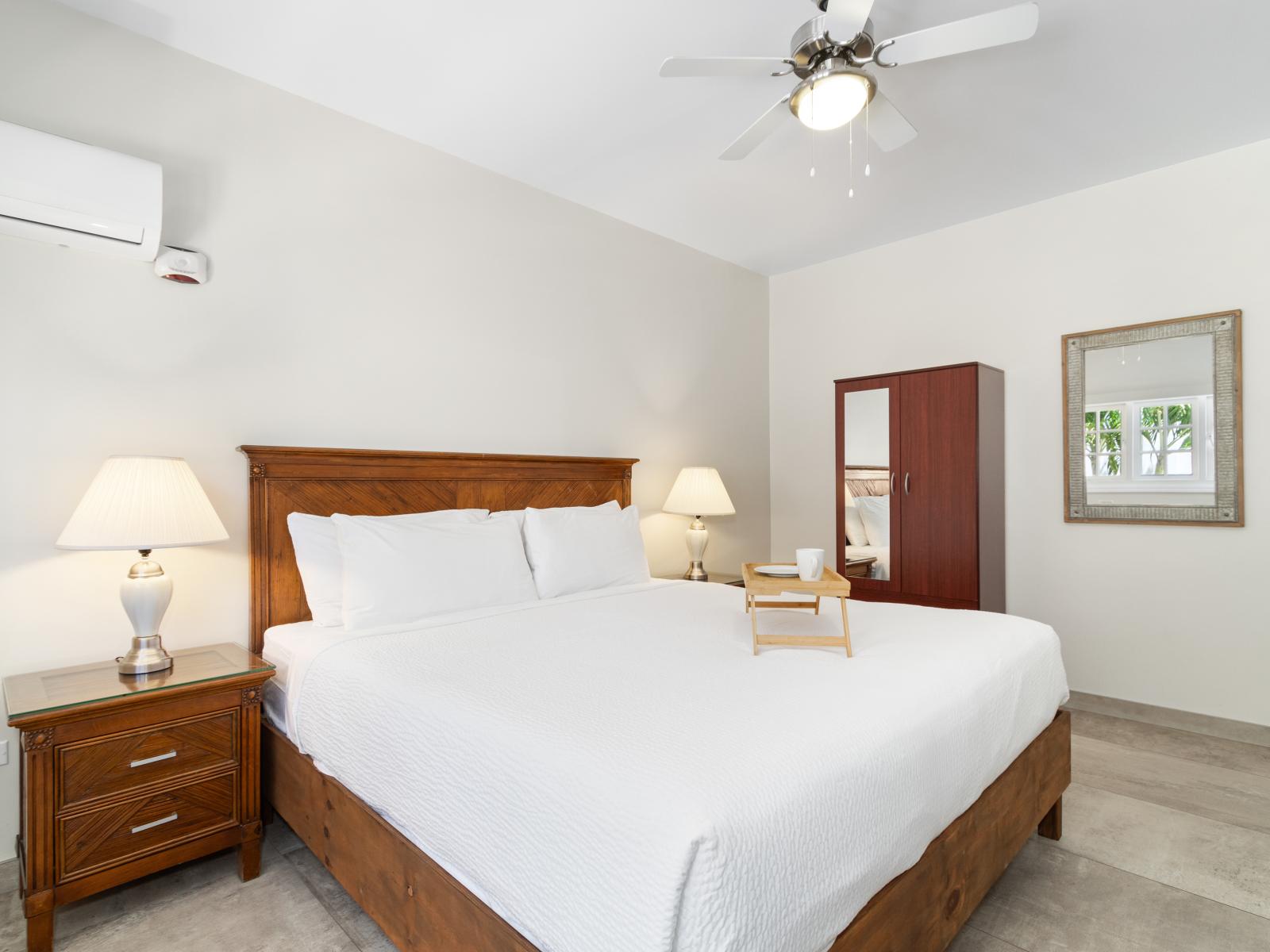 Luxury awaits: the third bedroom offers a spacious king bed and ensuite bathroom for a restful retreat.