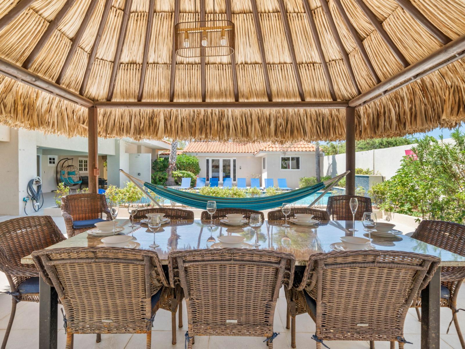 Alfresco dining under the palapa, offering a delightful outdoor experience.