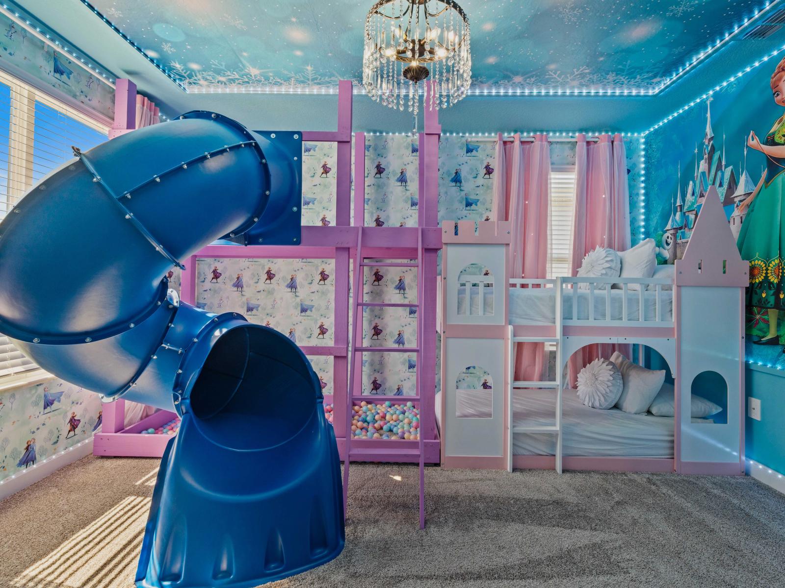 Frozen-themed bedroom of the Home in Davenport Florida - Featuring two bunk beds and a slide that promise excitement around every corner - Let fun begin little ones! - Play Area for fun and adventure