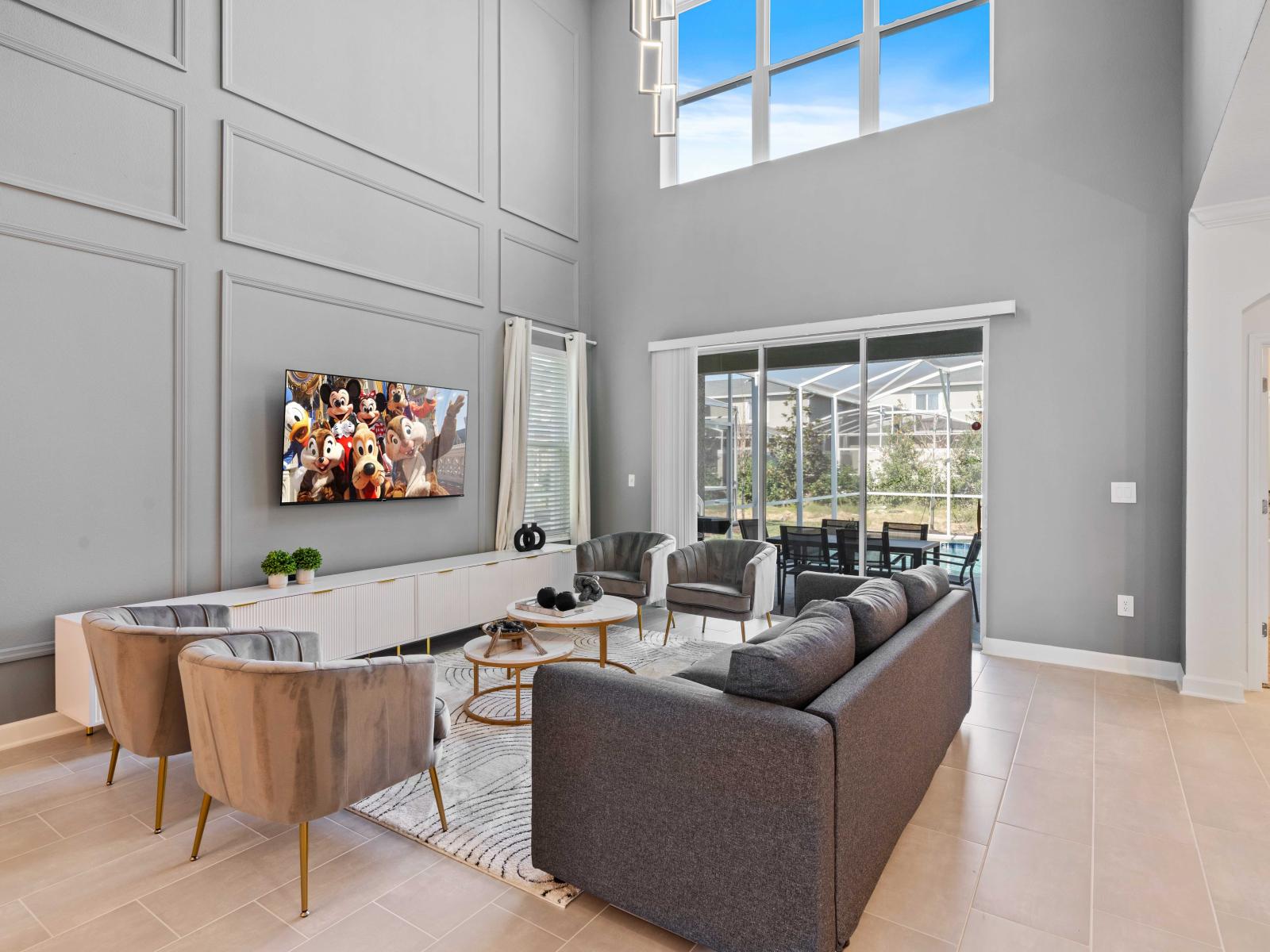 Lavish Living Area of the Home in Davenport Florida - Experience the epitome of elegance in living area - Every detail is curated for a luxurious and indulgent escape - Smart TV and Netflix - Versatile seating arrangements