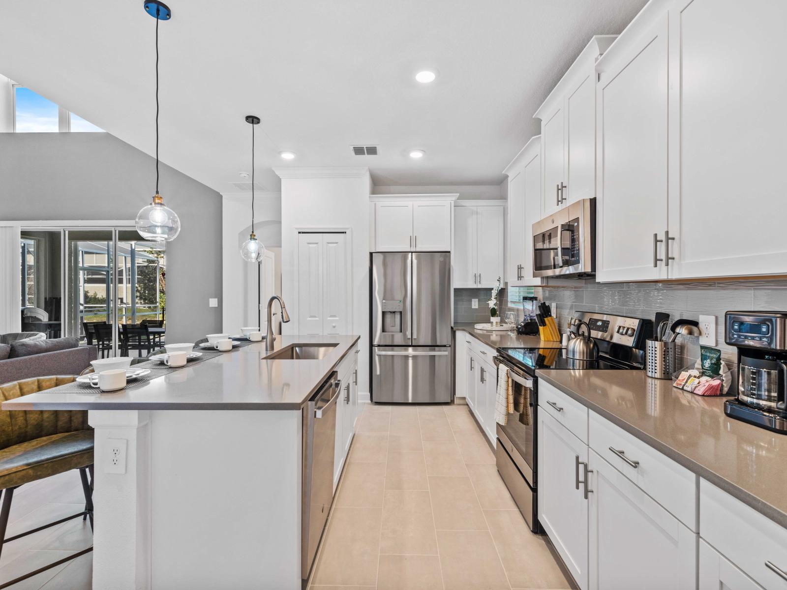 Amazing Kitchen of the Home in Davenport Florida - Step into a world of culinary sophistication with open-concept kitchen - Meticulously furnished for your comfort