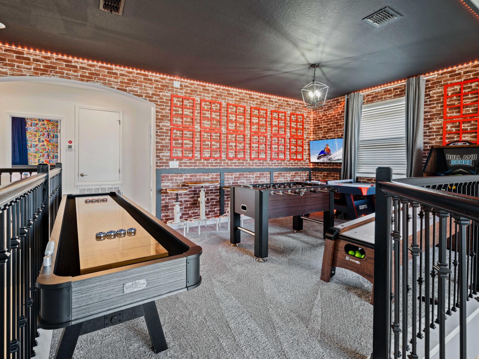 Game area Shuffleboard Table of the Home in Davenport Florida - Play Foosball or Shuffleboard and have fun time - Unwind in style