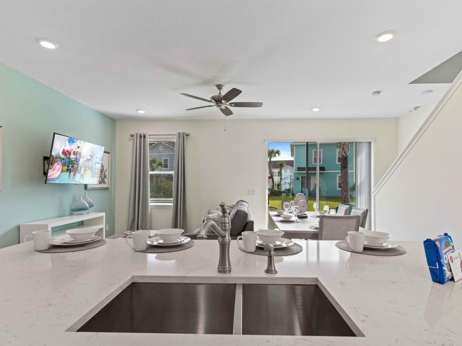 Lovely kitchen of the cottage in Kissimmee Florida - Fully equipped - Smart use of space with versatile storage solutions - Open concept connecting the kitchen to the dining and living area