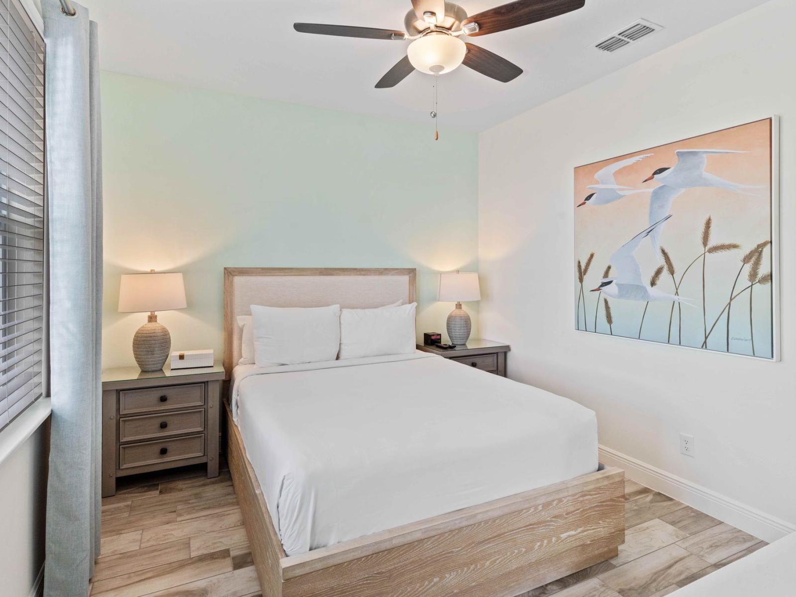 Calming bedroom of the cottage in Kissimmee Florida - Spacious bedroom offering comfort and style - Thoughtfully designed bedroom featuring functional and stylish furniture - Luxurious bedding for a restful night's sleep