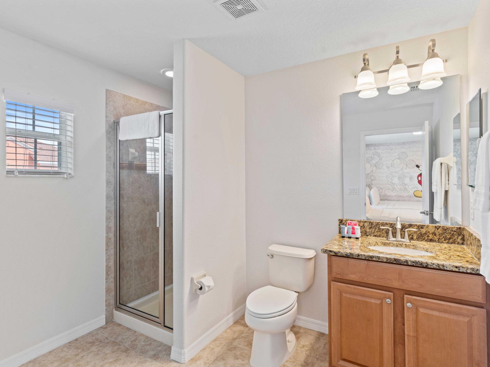 Refresh and Renew in Bathroom 3 with its Invigorating Walk-in Shower Experience.