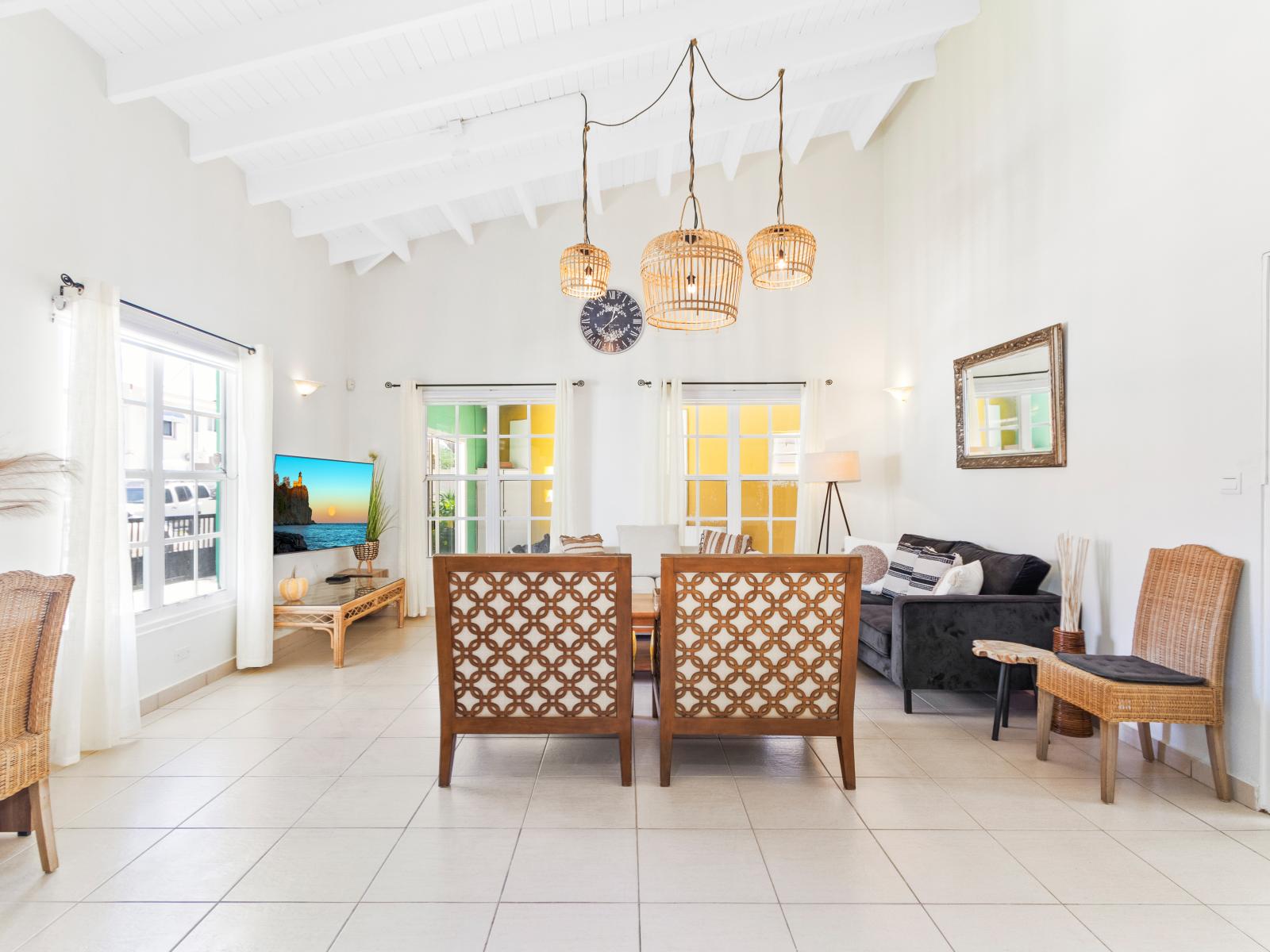 Radiant Living area of the 3BR House in Noord, Aruba - Cosy sofas and comfy chairs - Wonderful windows of living area for light and air - Fabulous sitting space with great ambiance  - Availability of TV and Netflix - Elegant Decor