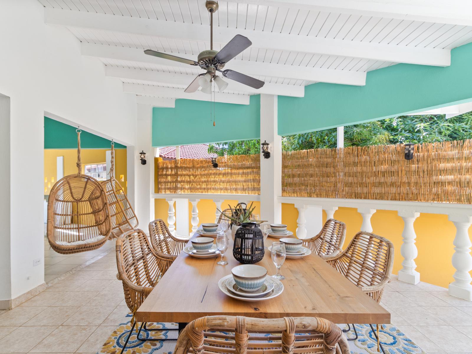 Wonderful dinning area of the 3BR House in Noord, Aruba - 6 Persons Beautiful Dinning - Dinning on private terrace with Breathtaking views  - Availability of 2 hanging chairs  - Elegant Decor with wall lamps - Soul enhancing space