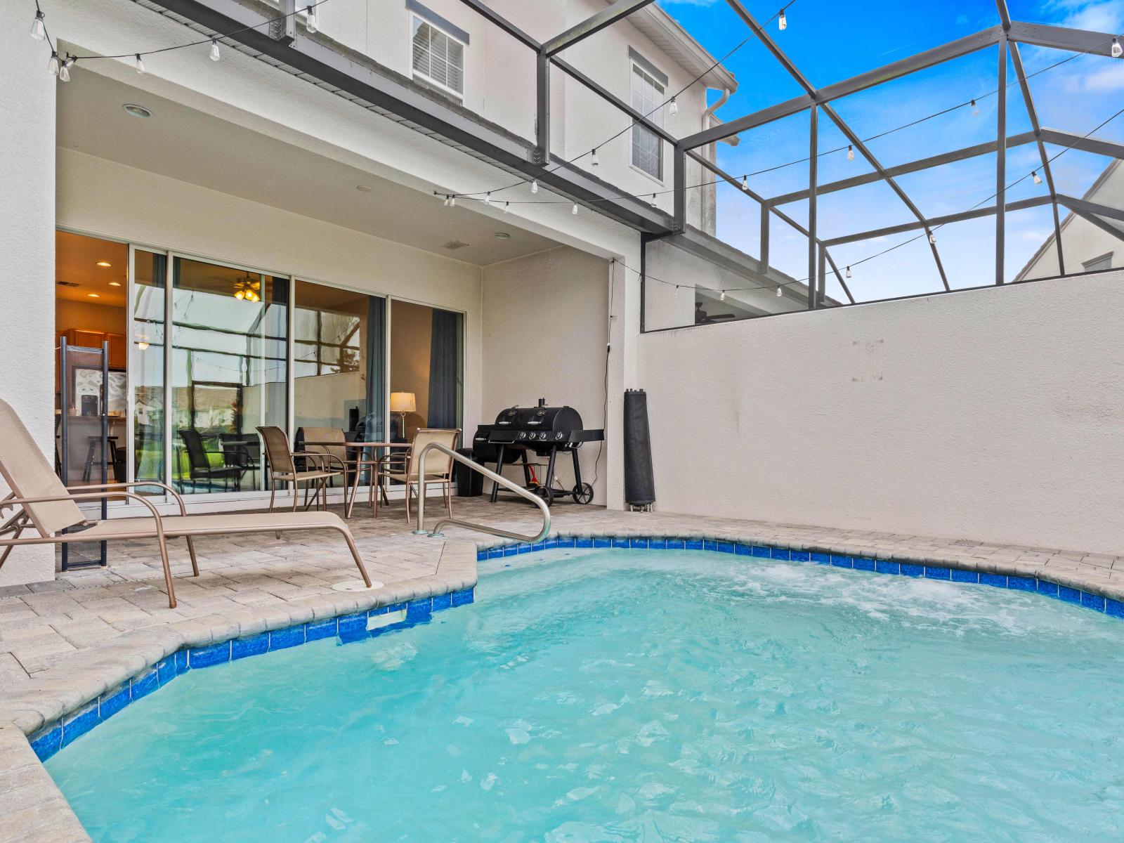 Refreshing Private Pool of the Townhouse in Davenport Florida - Inviting poolside loungers for basking in the sunshine - A tranquil retreat where you can indulge in relaxation