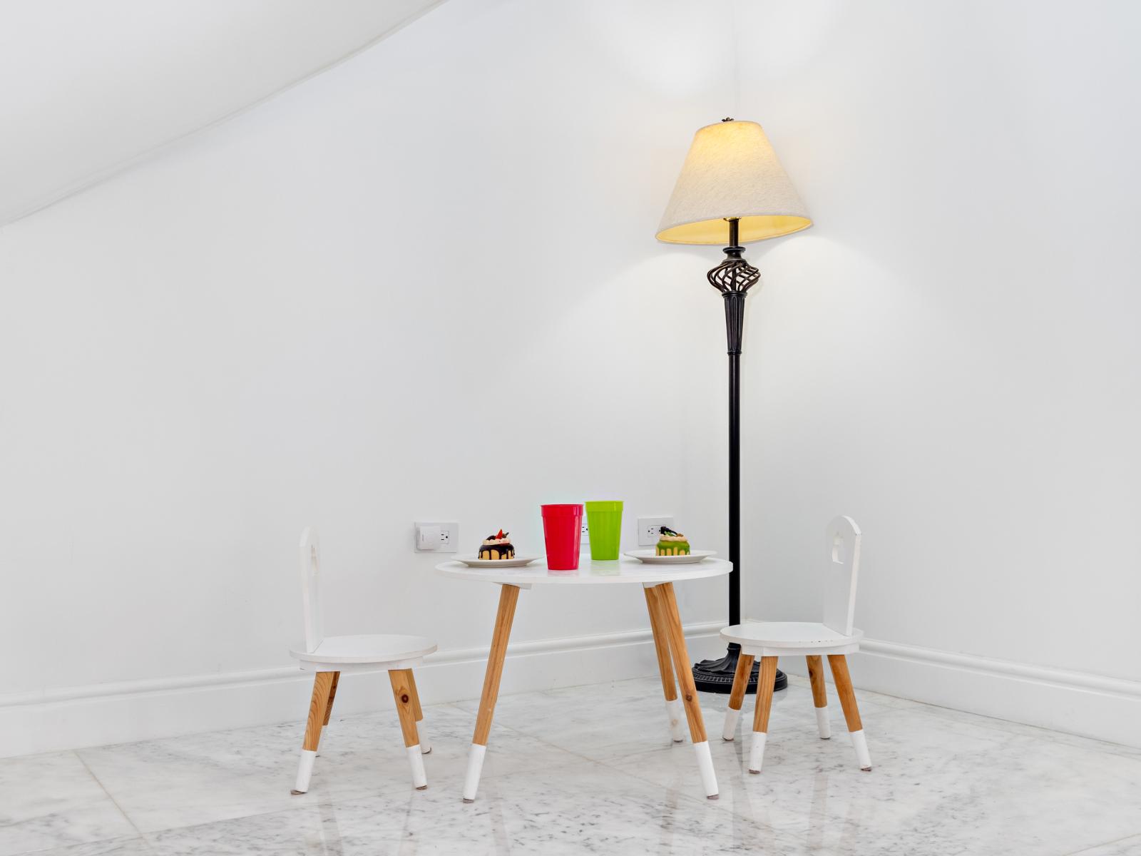 A charming little section designed for kids, complete with an adorable dining table tailored to their size.