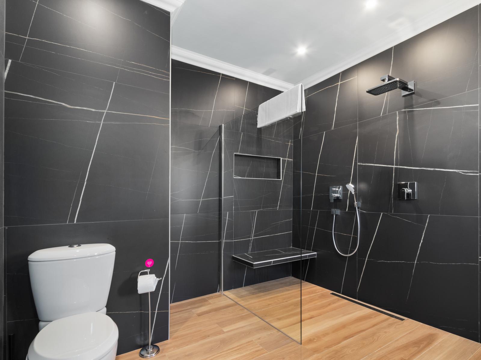 Main Bathroom: A modern and spacious bathroom with an inviting shower.