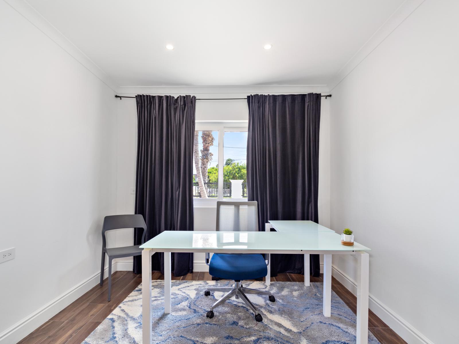 Transform bedroom two into a productive sanctuary with its dedicated home office space. With thoughtful design and ergonomic furnishings, this area offers a seamless blend of work and relaxation, ensuring every task is completed with ease and efficiency.