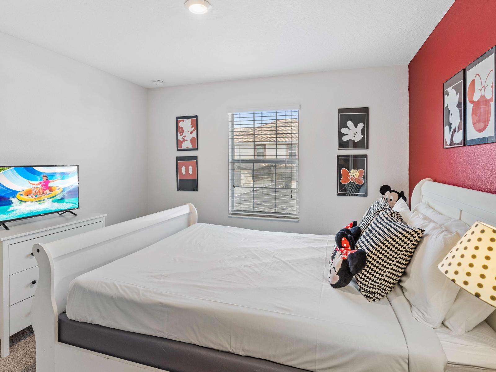 Experience the magic of Disney with our Mickey-themed room, complete with cozy double bed. - Stunning wardrobe with sufficient space - Enjoy the Availability of Smart Tv and Netflix - Indulge in mesmerizing views from the windows of the room