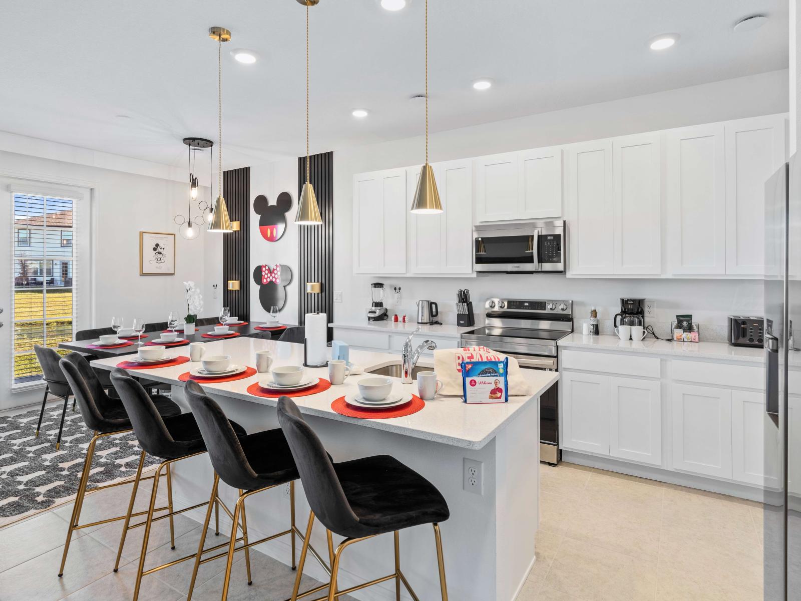 Sleek Kitchen of the Townhouse in Davenport Florida - Fully equipped kitchen - Magic of Mickey and Minnie Mouse fills the air  - Breakfast bar and high chairs