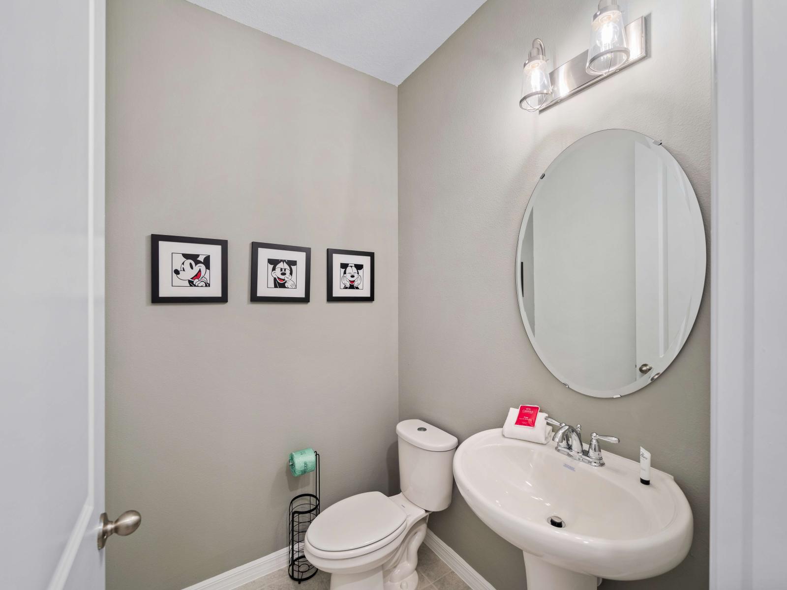 Elegant Half bathroom of the Townhouse in Davenport Florida - A convenient oasis tucked away for comfort. - Clean space with stylish decor