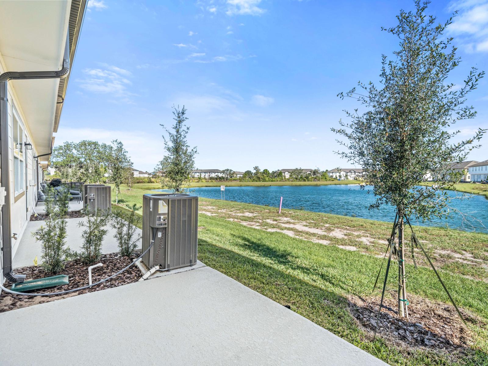 Outdoor Area of the Townhouse in Davenport Florida - Lush greenery and open skies create a perfect sanctuary for relaxation - Peaceful environment