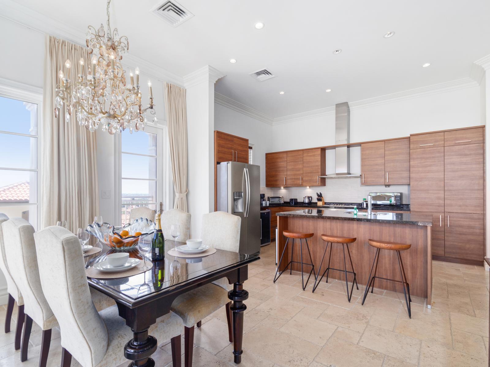 Dining Table and Kitchen Area- food is within your reach when the table is just right next to the kitchen