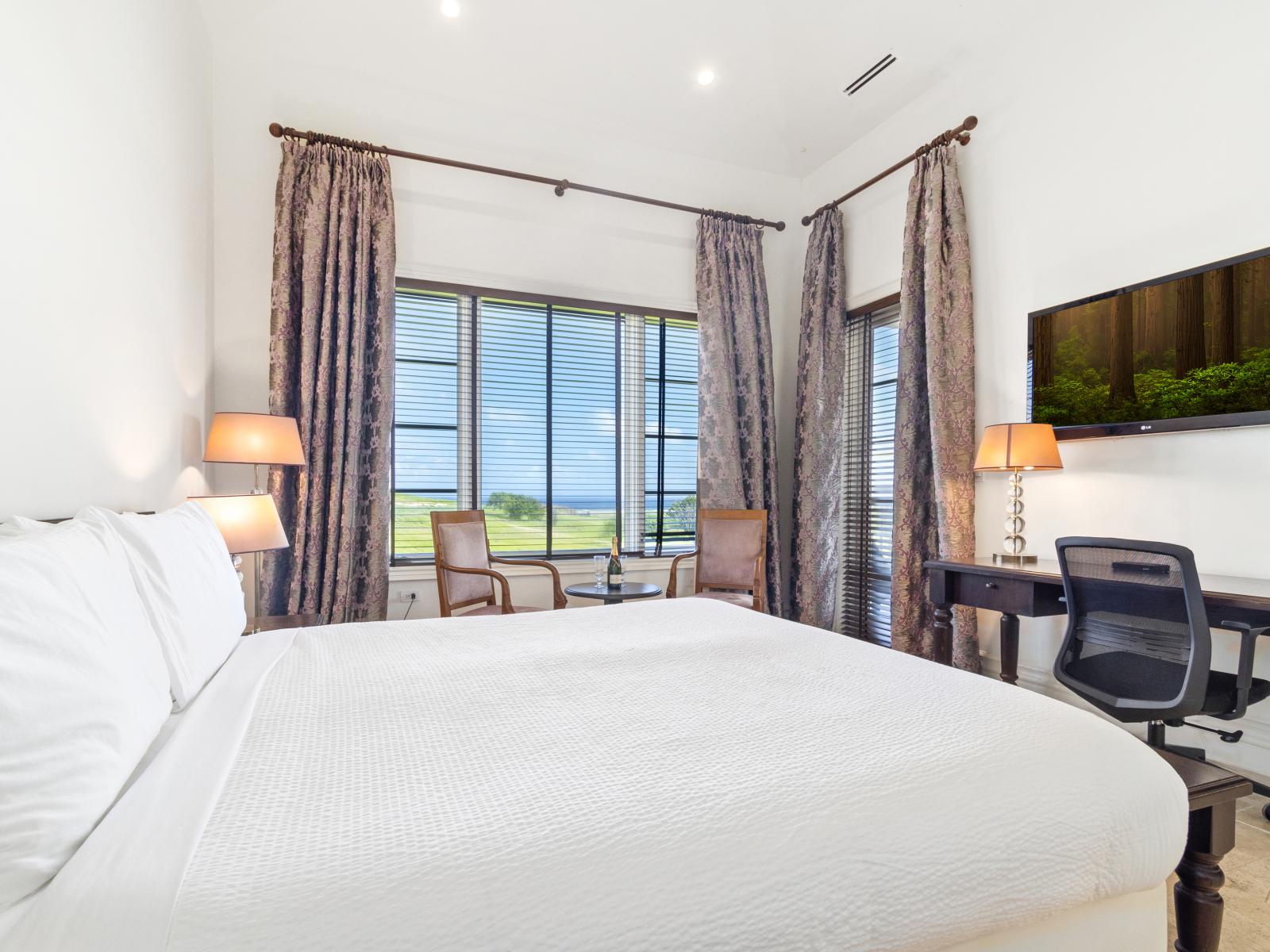 Discover Bedroom 2, offering a captivating vista that adds an extra layer of beauty to your stay. Whether it's the sunrise casting its golden hues or the city lights twinkling at night, this room promises a view that's as stunning as it is serene.