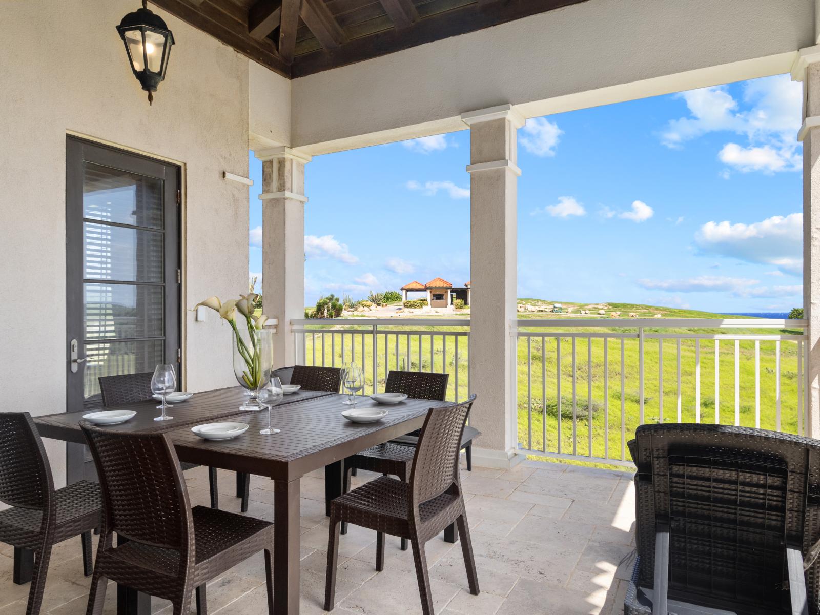 Balcony with Dining Table and Beautiful View of the Ocean and Nature.