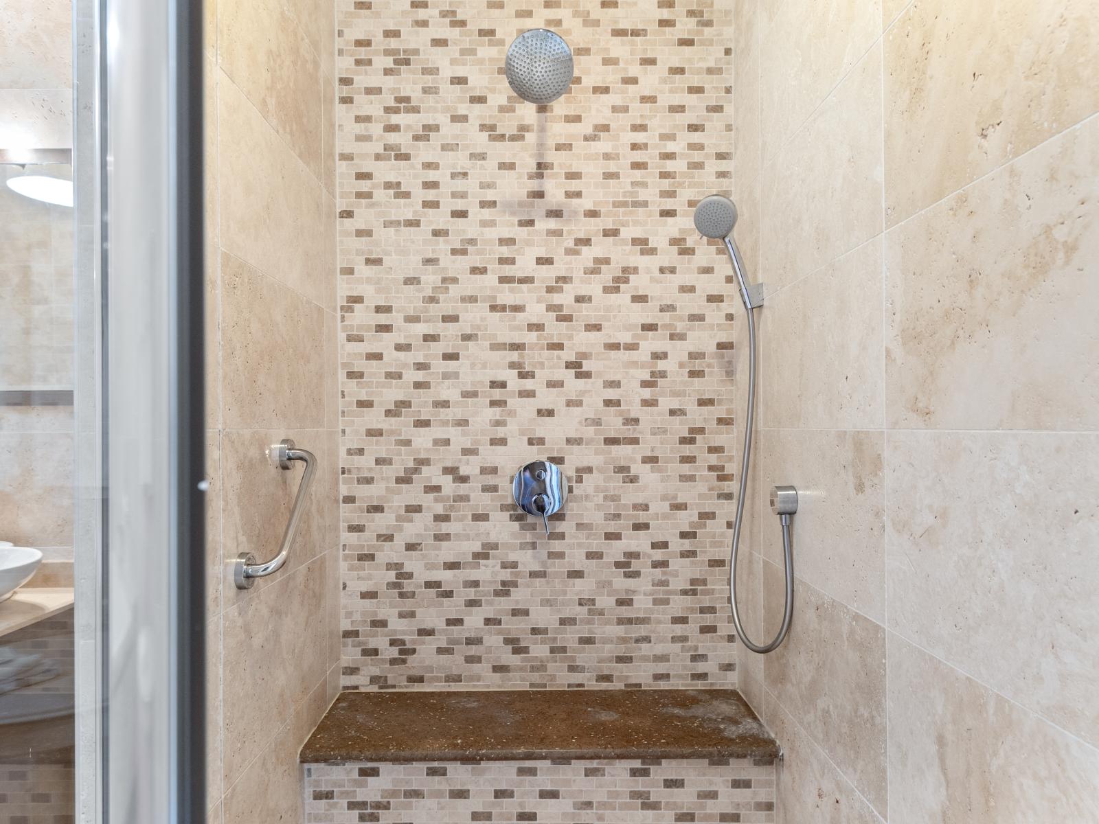 Refresh and renew in the third bedroom's bathroom, equipped with a sleek walk-in shower for your comfort.