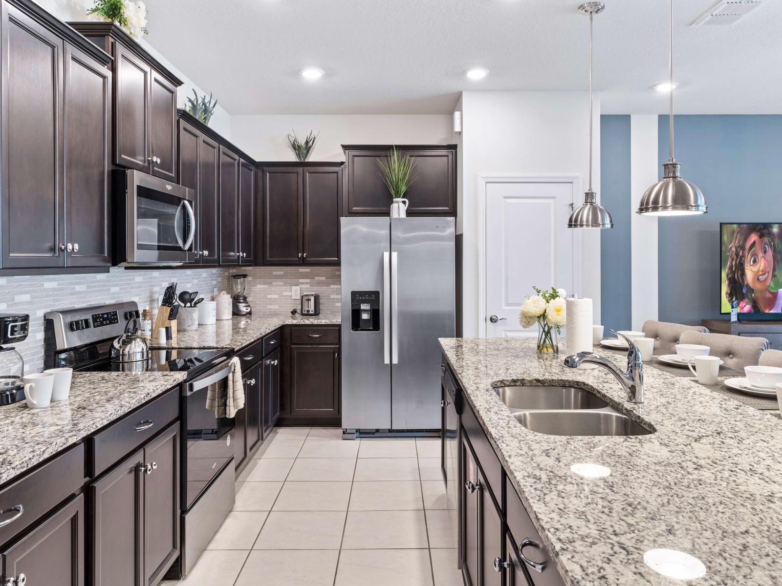 This stylish kitchen captures the essence of modern design, blending functionality and aesthetics seamlessly for a perfect cooking and gathering space.