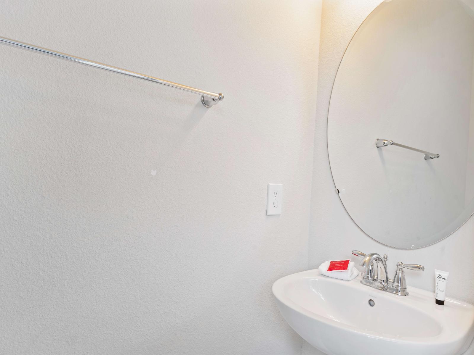 Our half bathroom provides a comfortable spot for a quick touch-up.