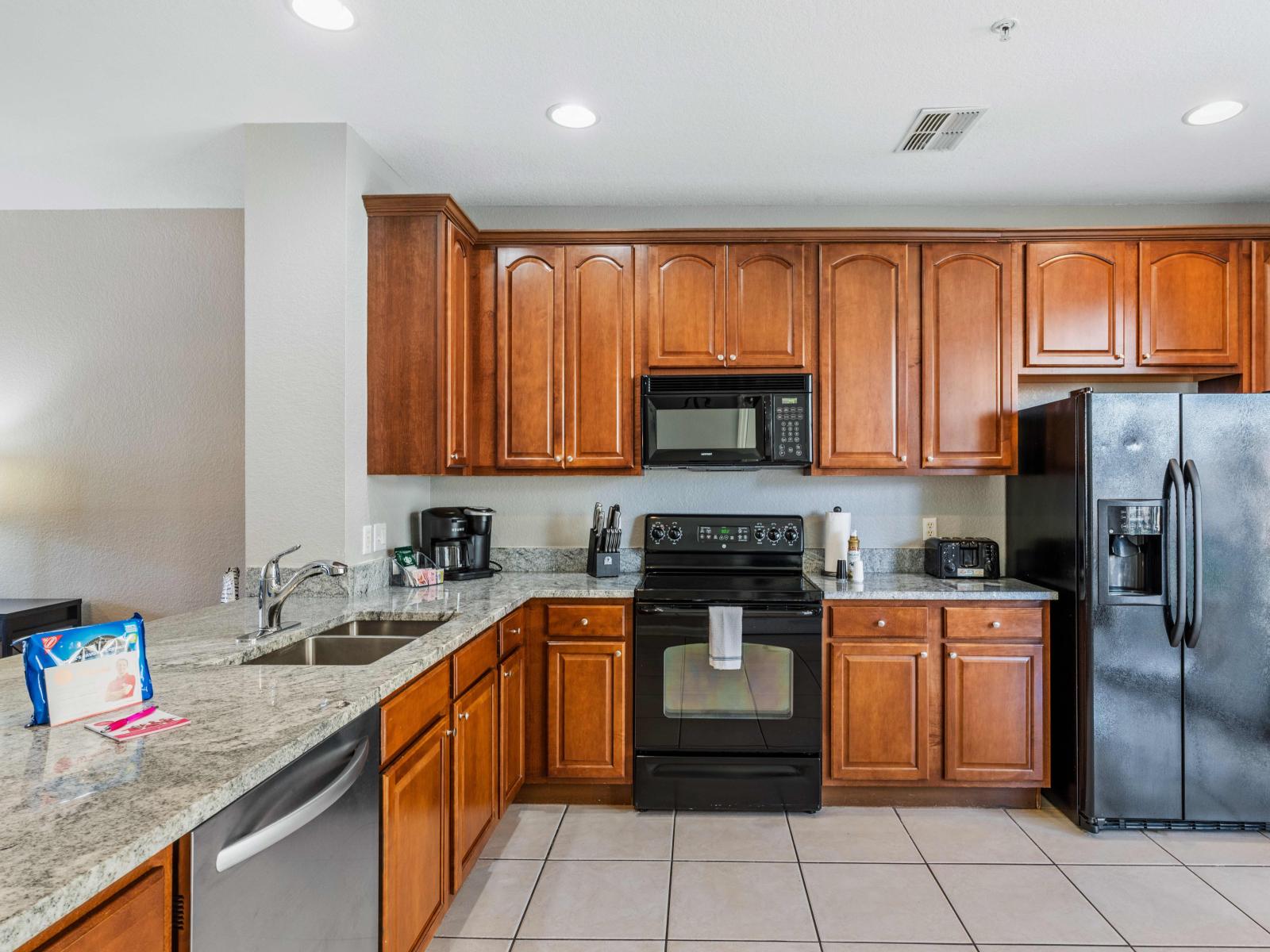 Awesome kitchen of the townhouse in Orlando - Every detail is crafted to inspire gourmet creations and memorable dining experiences. - Plenty of space to store goods - Availability of all kitchen accessories including stainless steel appliances