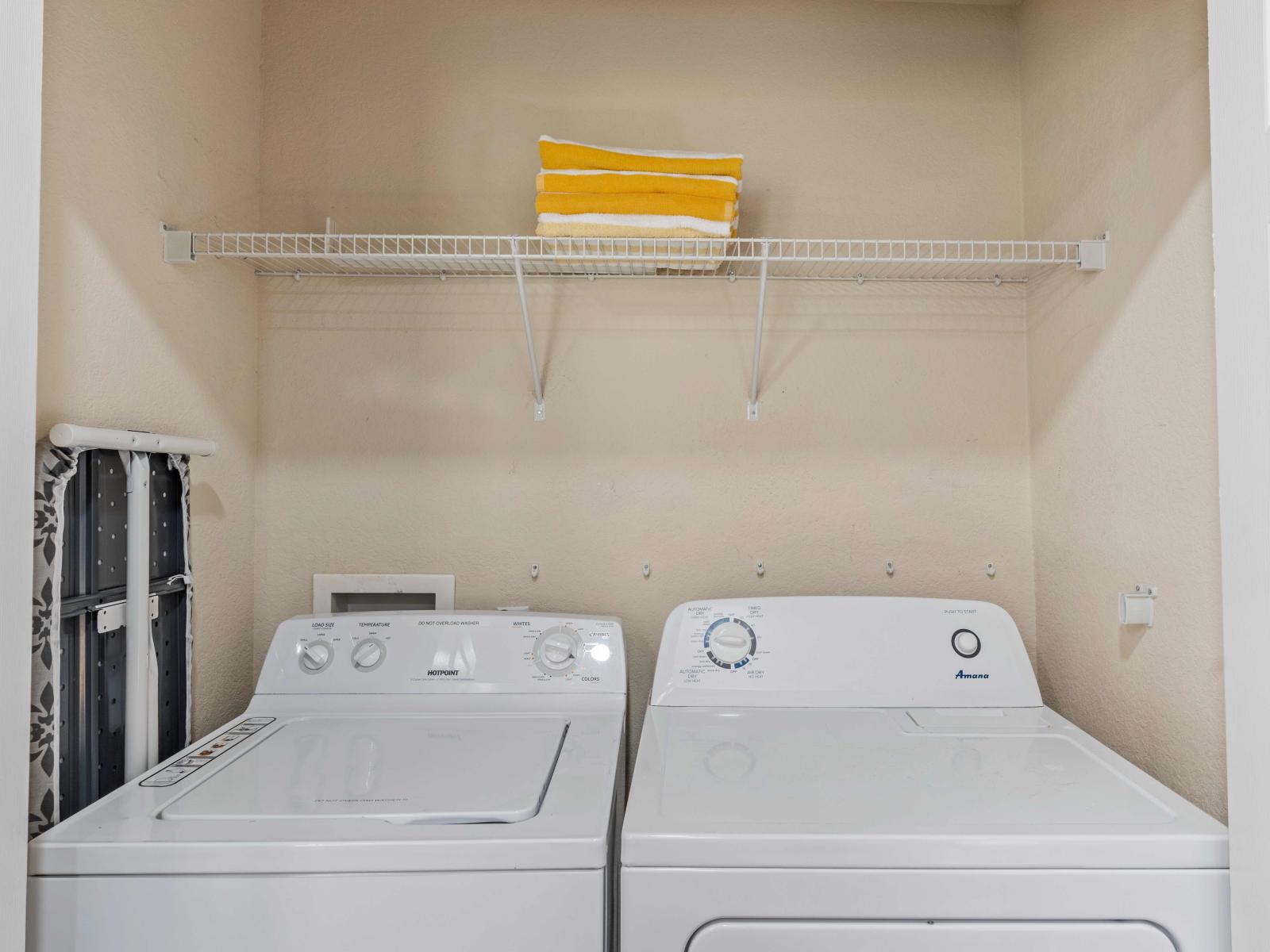 Convenient Laundry are of the townhouse in Orlando - With a full washer and dryer - Enjoy the convenience of on-site laundry facilities for a hassle-free and enjoyable stay - Keep your clothes and wardrobe fresh throughout your stay