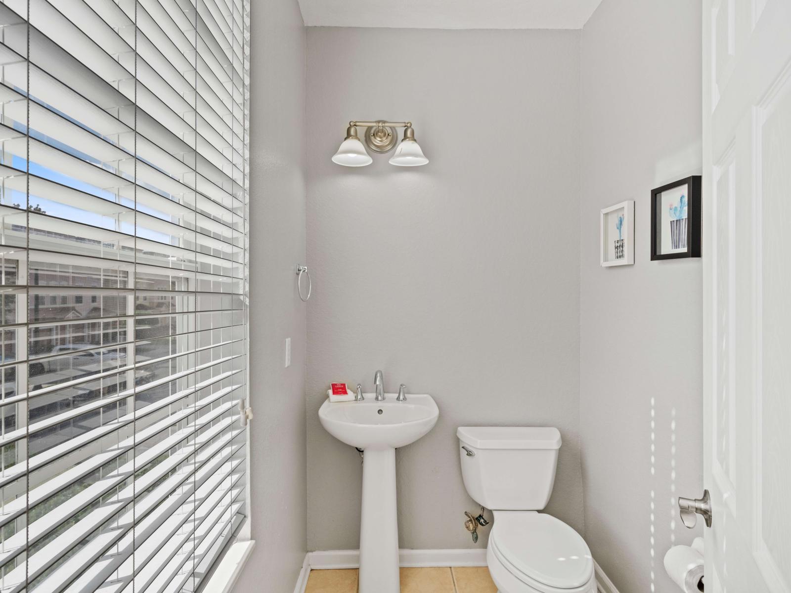 Half bathroom-A compact yet stylish space offering convenience and practicality, ensuring a seamless experience for all.