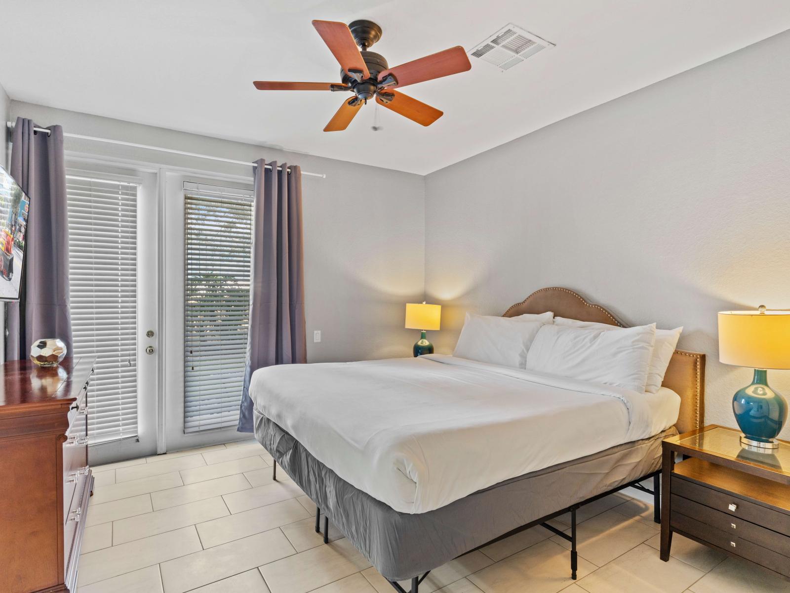 Bedroom 1 offers a luxurious escape with its king-size bed and attached bathroom featuring a walk-in shower.