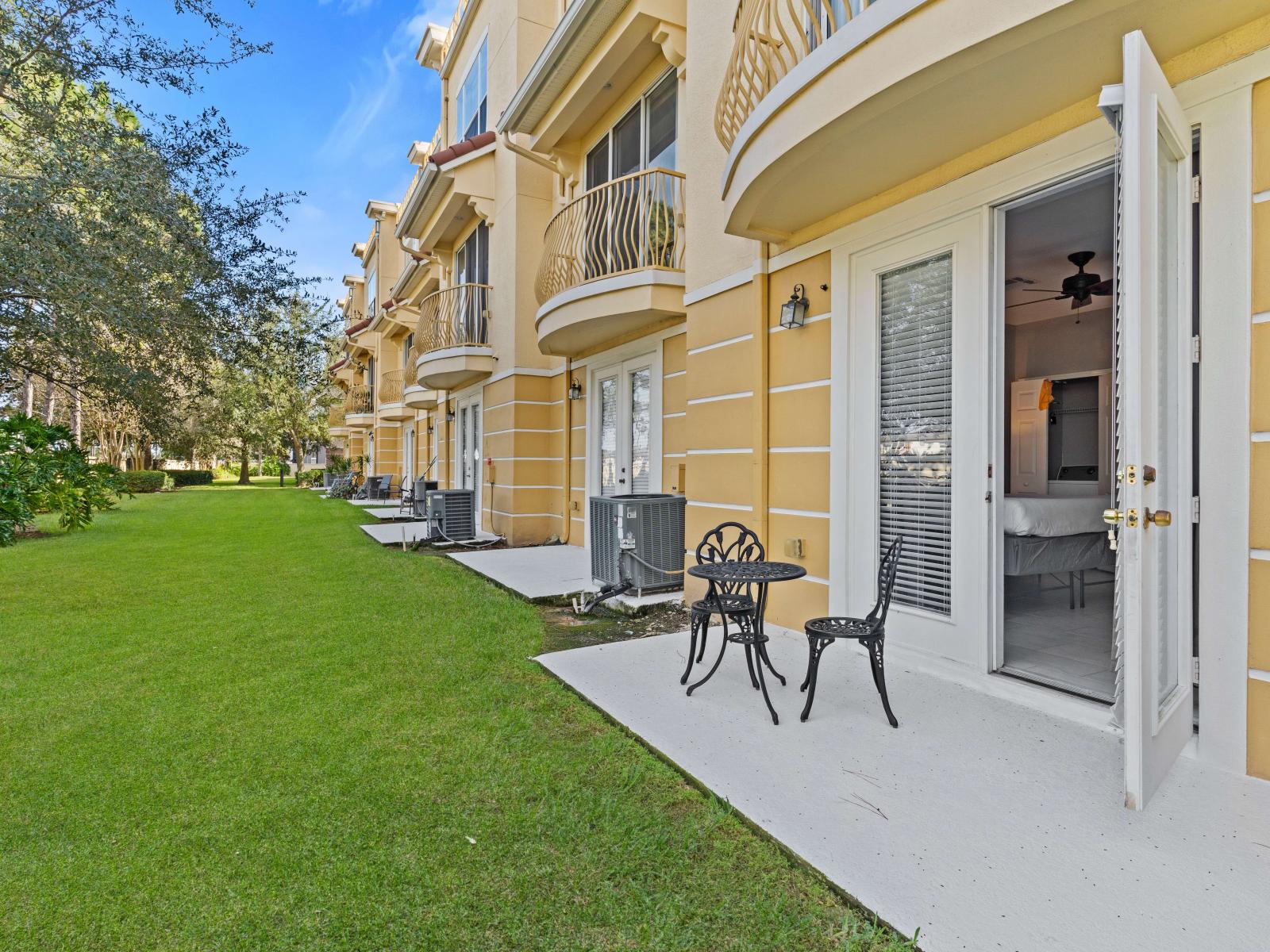 Step onto the patio outside Bedroom 1, a serene retreat where relaxation meets outdoor splendor.