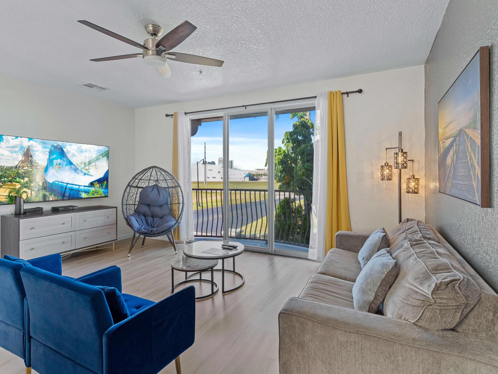 Step into a world of warmth and hospitality in our inviting living room of the townhouse at Vista Cay Resort - Plush sofas and soft lighting create the perfect setting for relaxation. - Embrace the charm of our chic living room with private Balcony