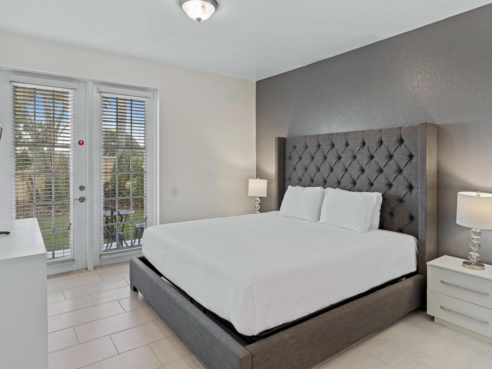 Luxury Bedroom of the townhouse at Vista Cay Resort in Orlando - Offers unparalleled comfort with a king-size bed and an en-suite bathroom.  - Providing convenient access to luxurious amenities. - Availability of TV and Netflix