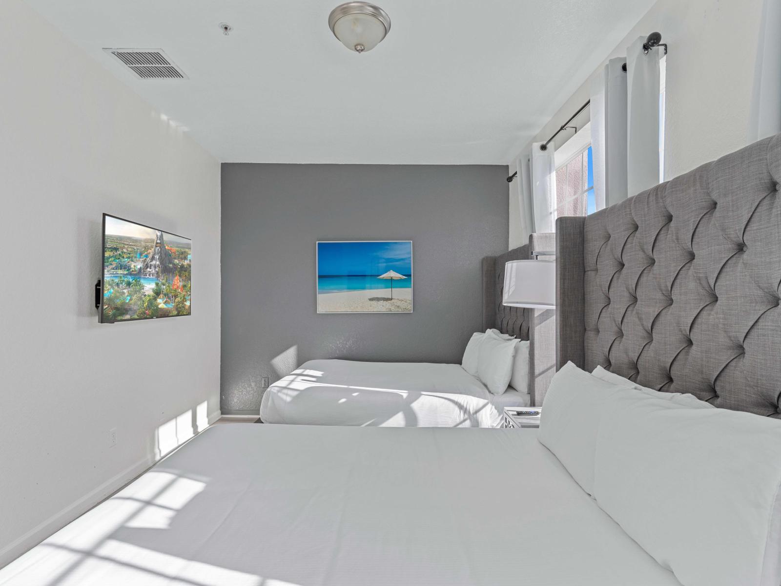 Experience the luxury of our Bedroom Suite of the townhouse at Vista Cay Resort - With two queen-size beds and plenty of space to stretch out and unwind after a day of adventures. - Smart TV and Netflix Is available for the entertainment.