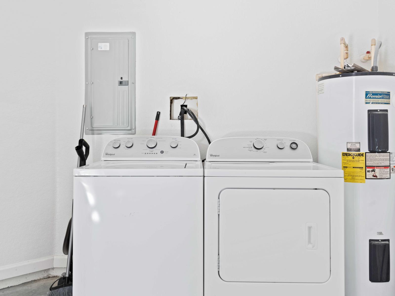 Full size washer and dryer located in garage