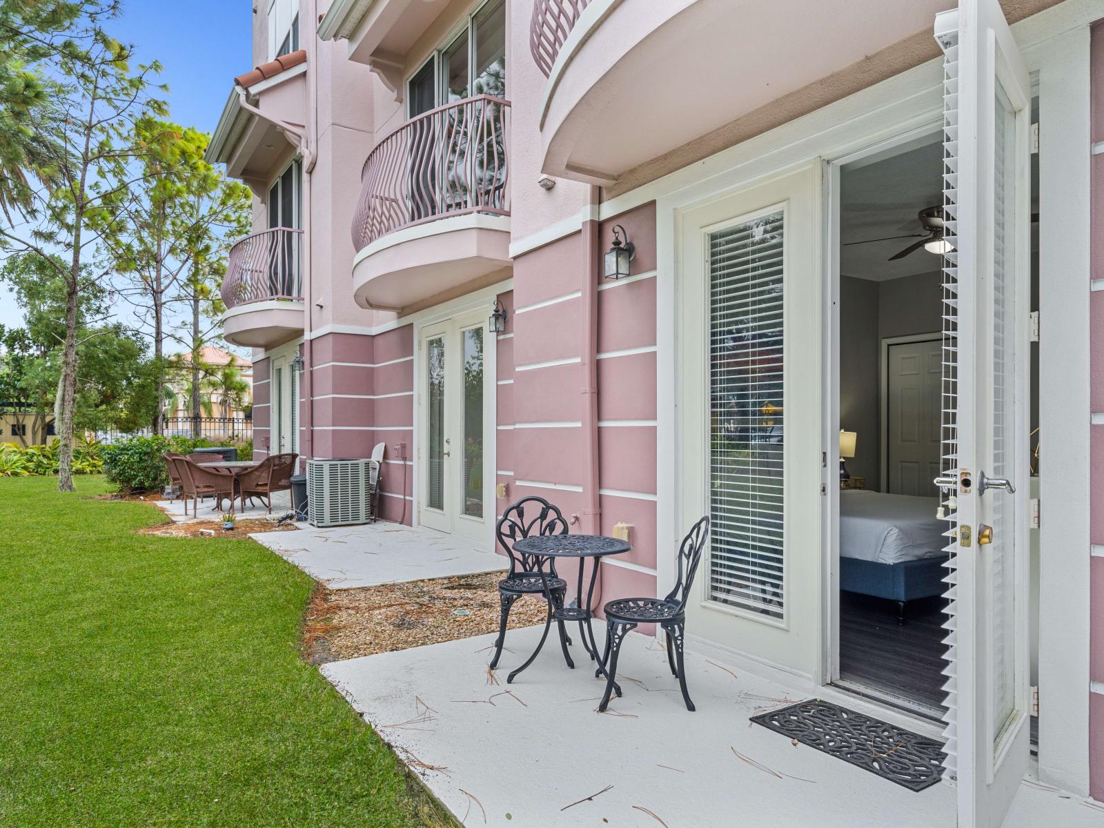 Garden Hideaway: Embrace the beauty of our outside patio, an intimate space outside your bedroom where lush greenery and fresh air surround you.