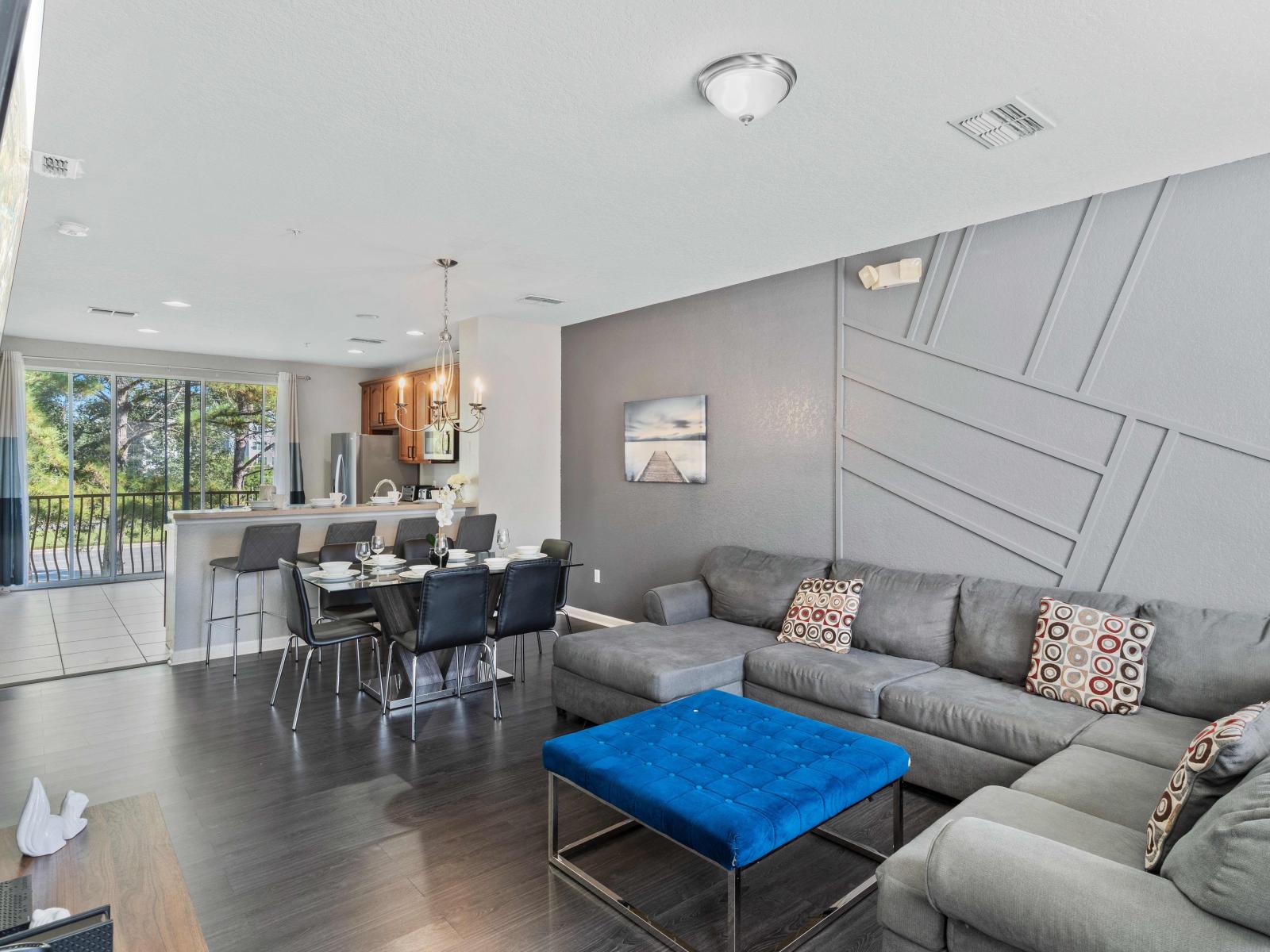 Living room with foosball table, electric fireplace and Smart TV