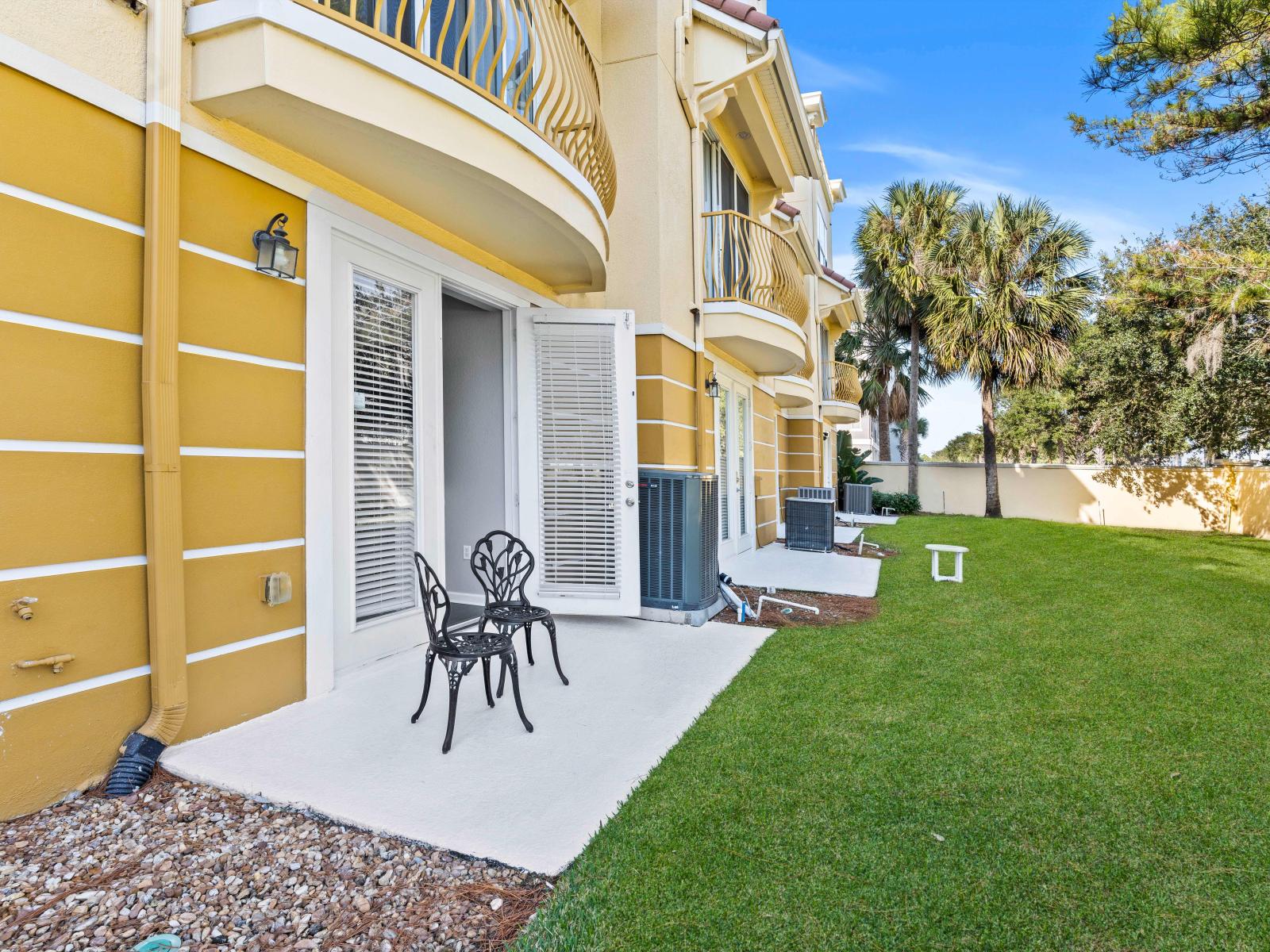 Step Into Tranquility: Enjoy Serene Moments on the Patio Just Outside Bedroom 1.