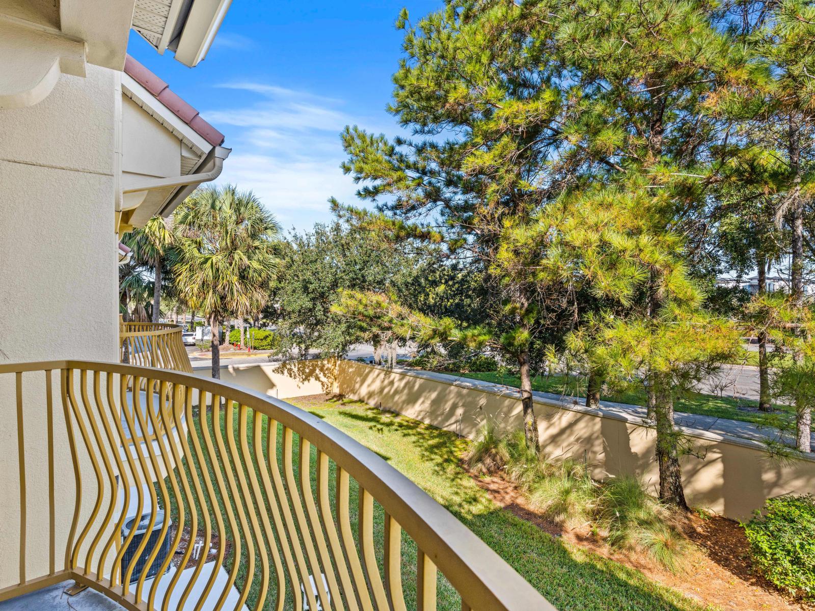 Enjoy Scenic Vistas: Take in the Stunning Views from Our Kitchen Balcony Retreat.