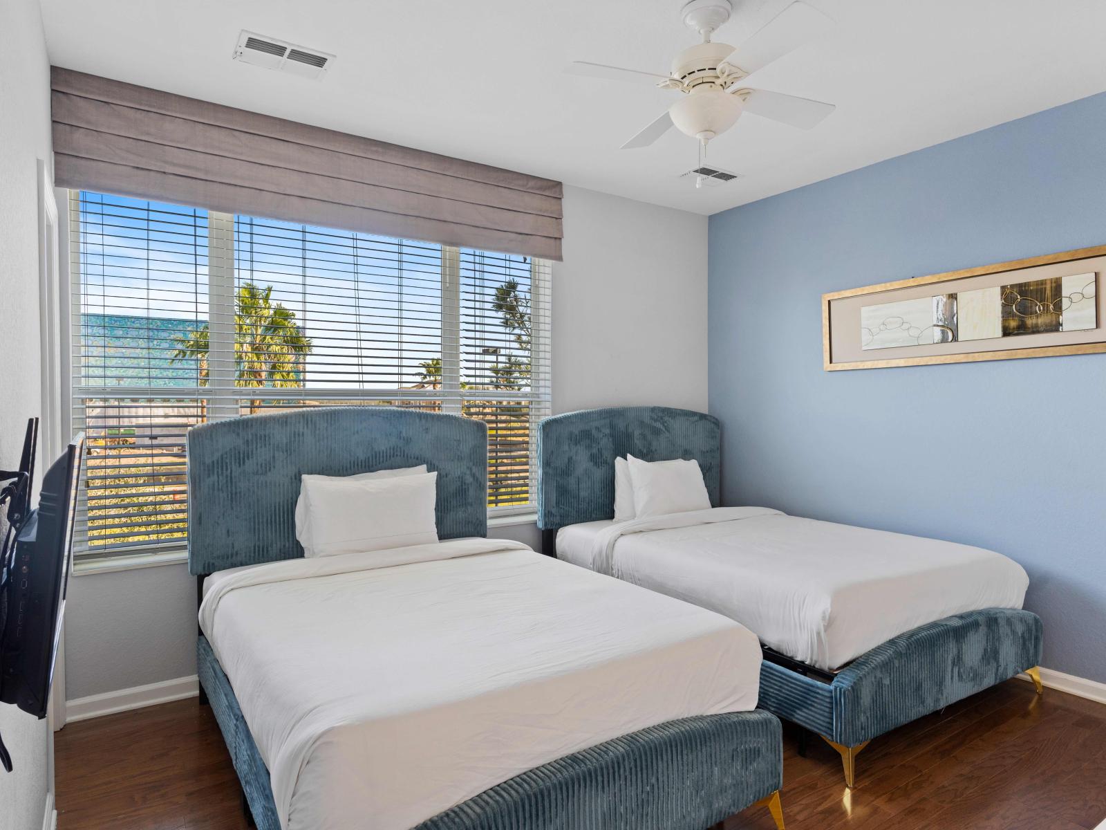 Twin Tranquility: Embrace the serenity of our double bedroom, where twin beds and tasteful decor create a peaceful retreat.