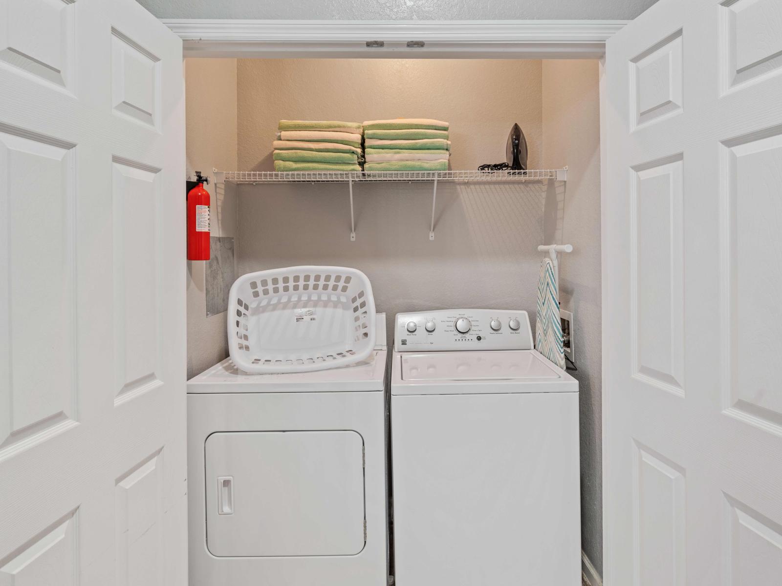 Laundry room with full washer and dryer