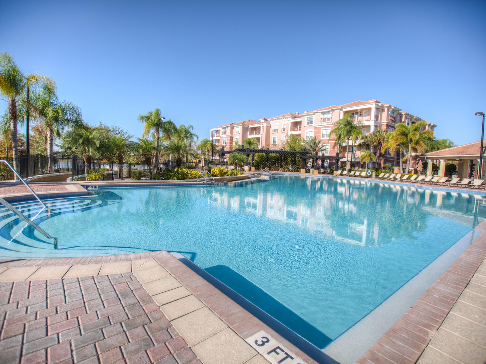 Dive into relaxation at our Vista Cay Resort's pool - Surround yourself with lush tropical landscaping and palm trees - Gather with friends and family at the poolside seating areas -  Escape the sun and retreat to one of our shaded cabanas