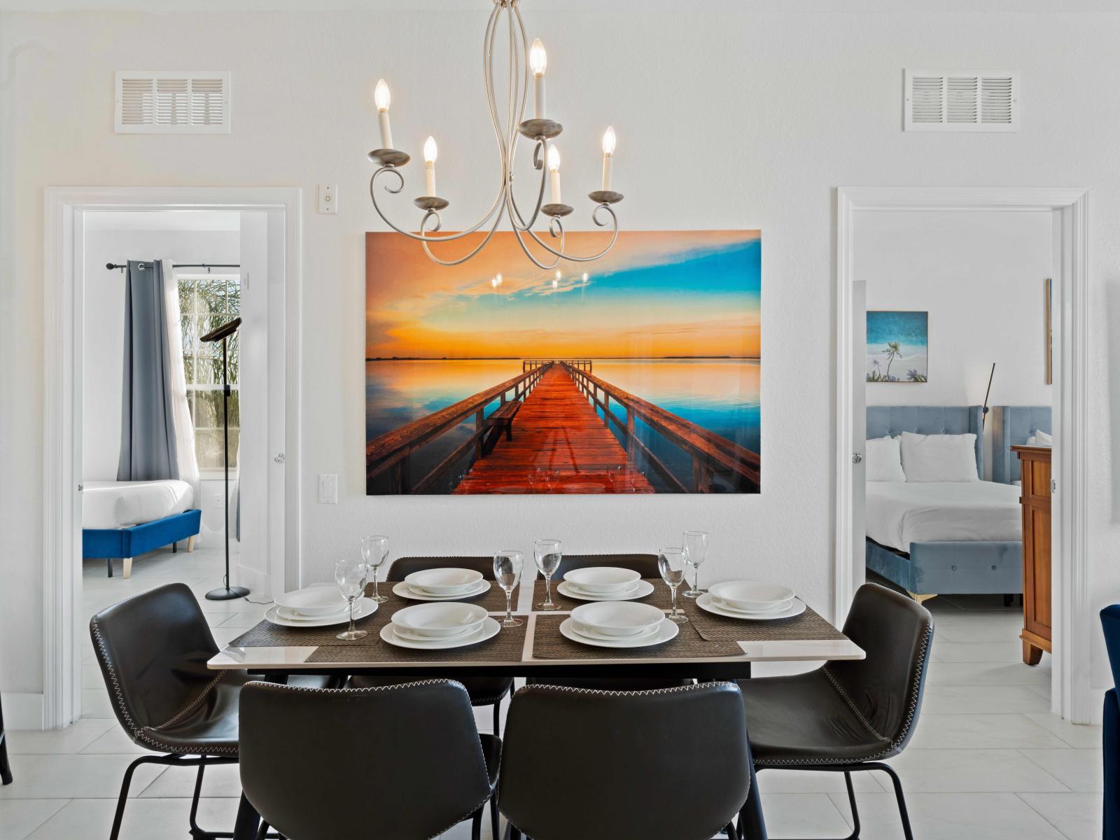 Radiant dinning area of the condo in Orlando - Enjoy your meals with your family or friends in our inviting dinning area - Completed with 6 persons cozy dinning table  - Decored with lovely wall painting and glorious chandelier