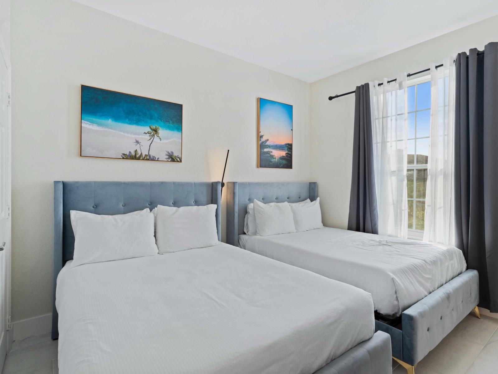 Marvelous bedroom of the condo in Orlando - Featuring twin double beds with neat linen and soft pillows - Beautifully decored with ocean view paintings - Bright window for proper ventilation and stunning views