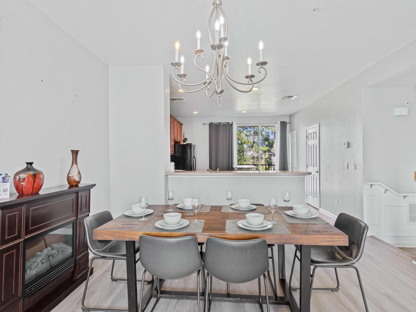 Gather around and savor the moments in this elegant dining area. With its spacious layout and inviting atmosphere, this dining space sets the stage for memorable meals and delightful conversations.