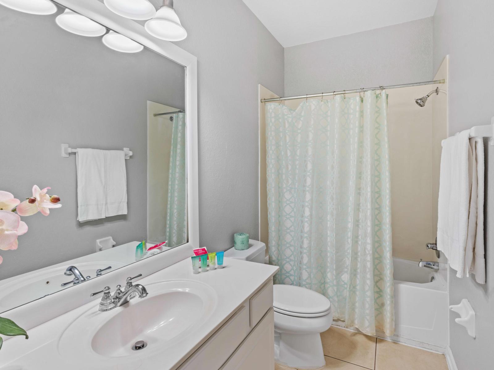 Bathroom 2 features a convenient tub/shower combination, providing the option for a quick shower or a leisurely soak.