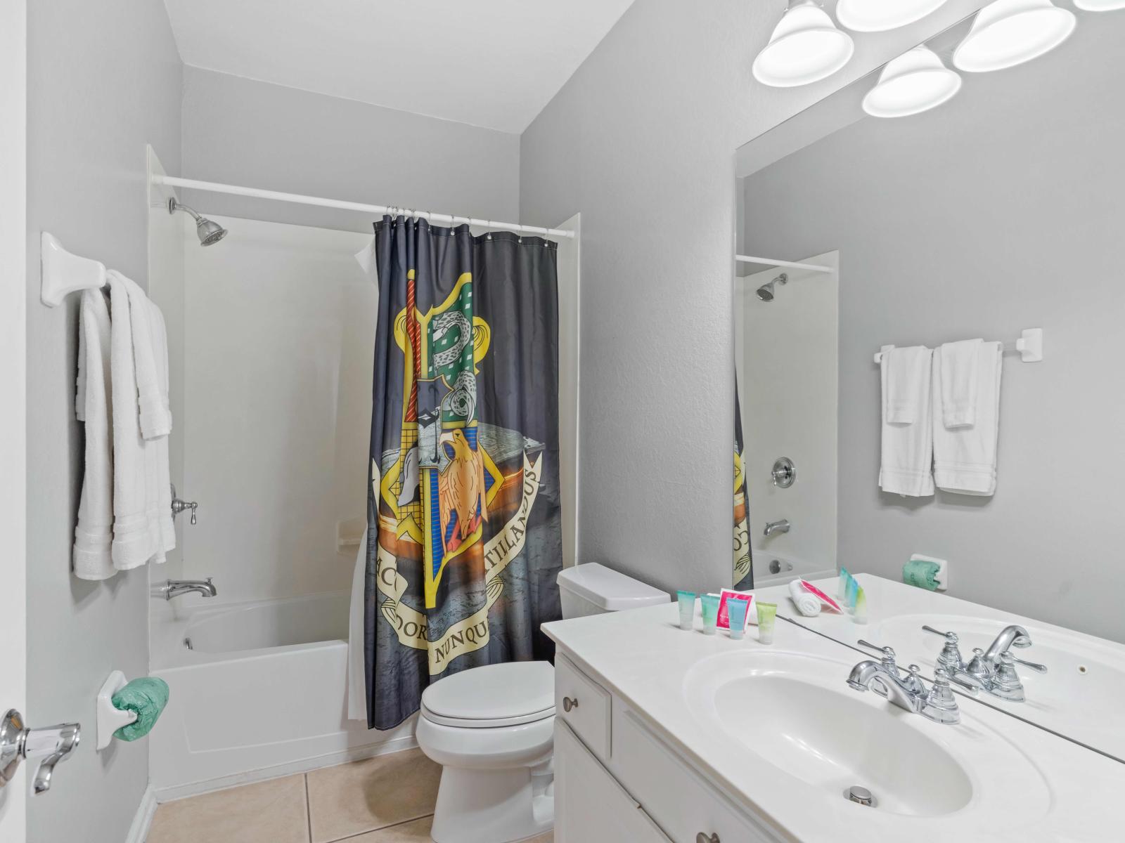 Relaxation Oasis: En-suite Bathroom 2 at Vista Cay Resort boasts a convenient tub/shower combination, providing guests with a soothing oasis to unwind and rejuvenate after a day of adventure, ensuring comfort and luxury throughout their stay.