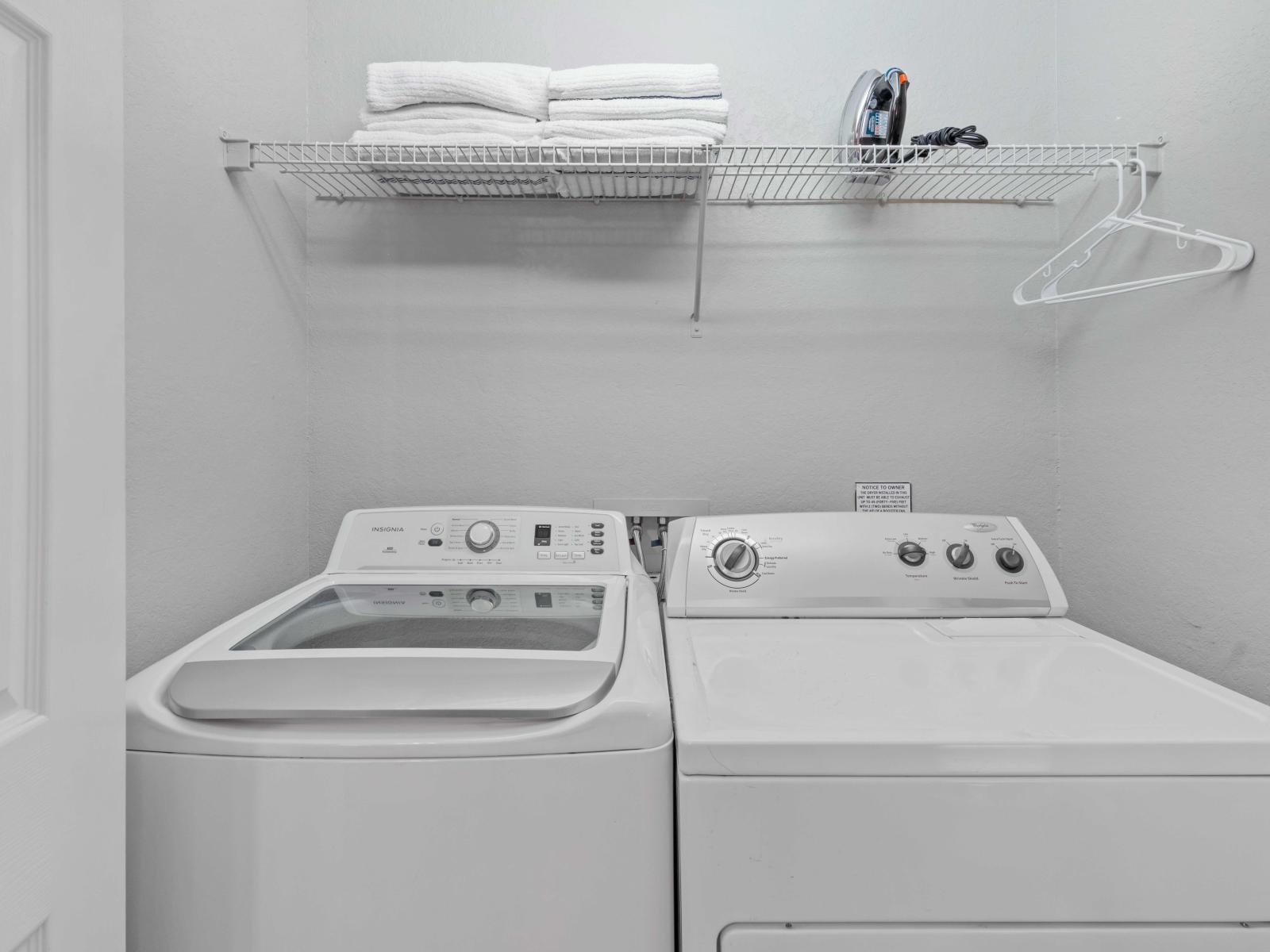 The laundry room at Vista Cay Resort boasts a full washer and dryer setup, providing guests with the ultimate convenience to refresh their wardrobe and maintain their vacation rhythm effortlessly.