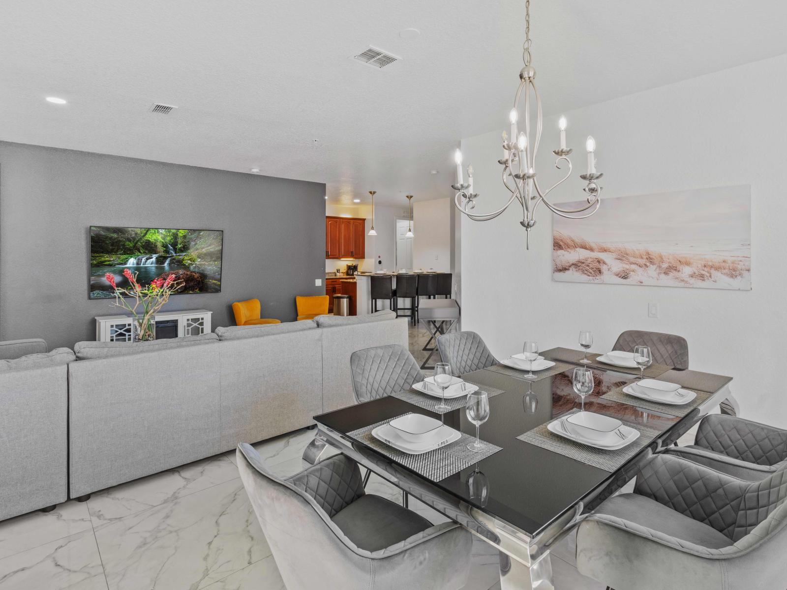 Elegant Dining area with comfortable chairs to  enjoy more your food right next to the living area