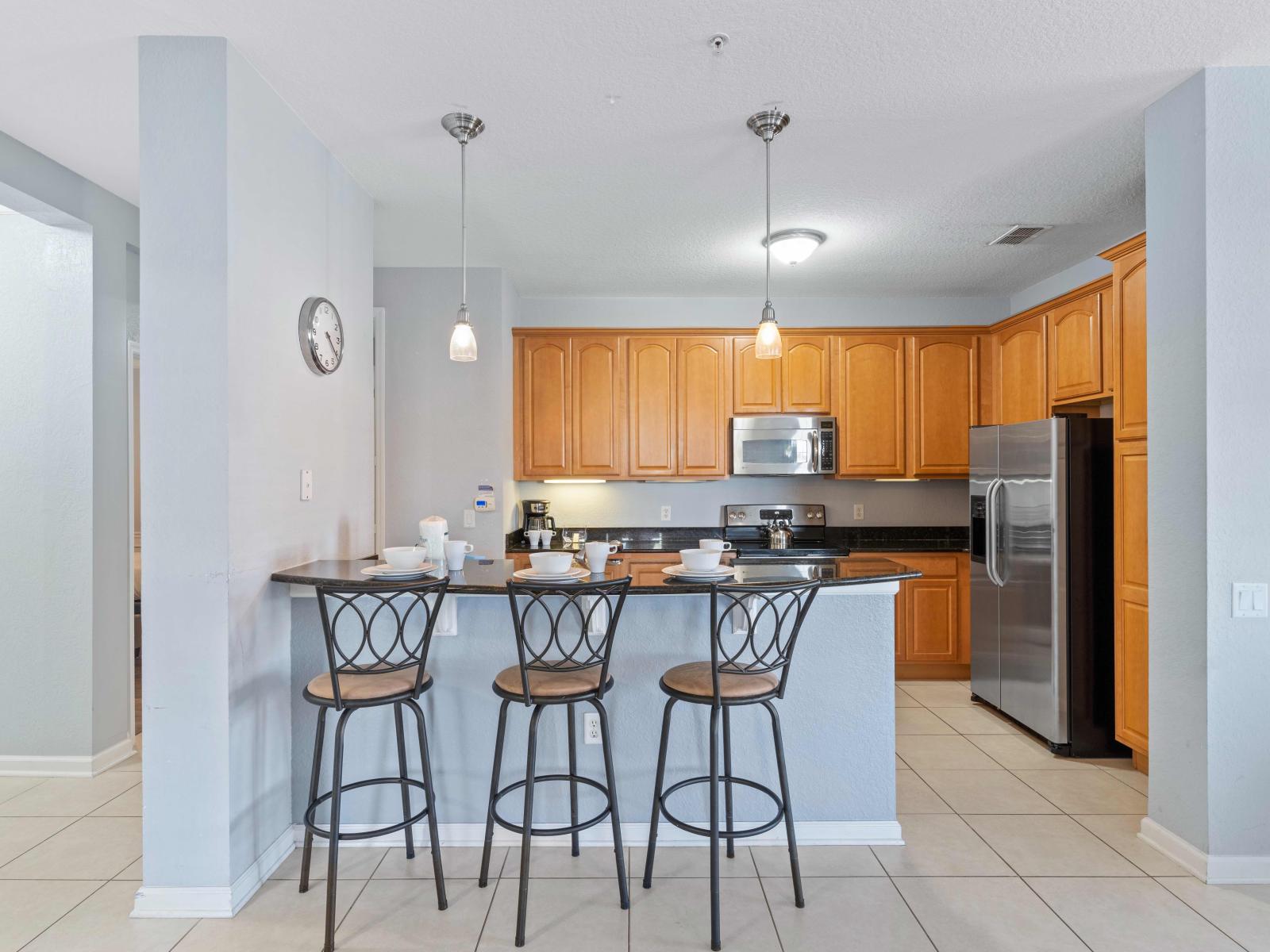 This modern kitchen is designed to inspire your inner chef, boasting state-of-the-art appliances, ample counter space, and all the utensils and cookware you need to whip up delicious meals.