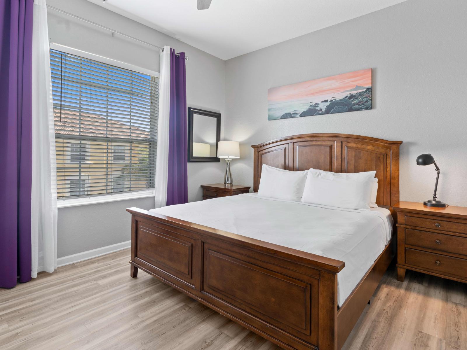 Enjoy Bedroom 2 featuring a spacious king-size bed, perfect for a comfortable and relaxing stay.